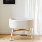 M26834GYLB,Babyletto,babyletto x GATHRE Capsule Bassinet in Ivory